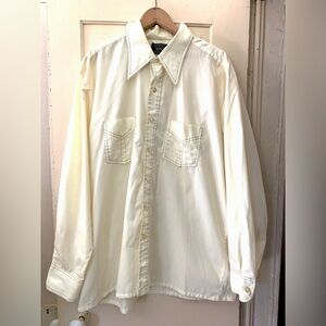 Vintage 1970s button down top with brown stitch detailing.